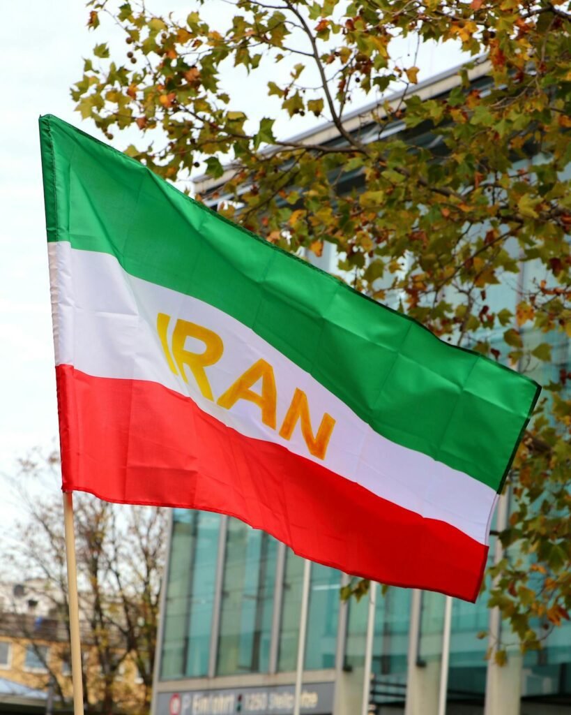Iran flag waving — post-war Iran JCPOA revanchism geopolitics