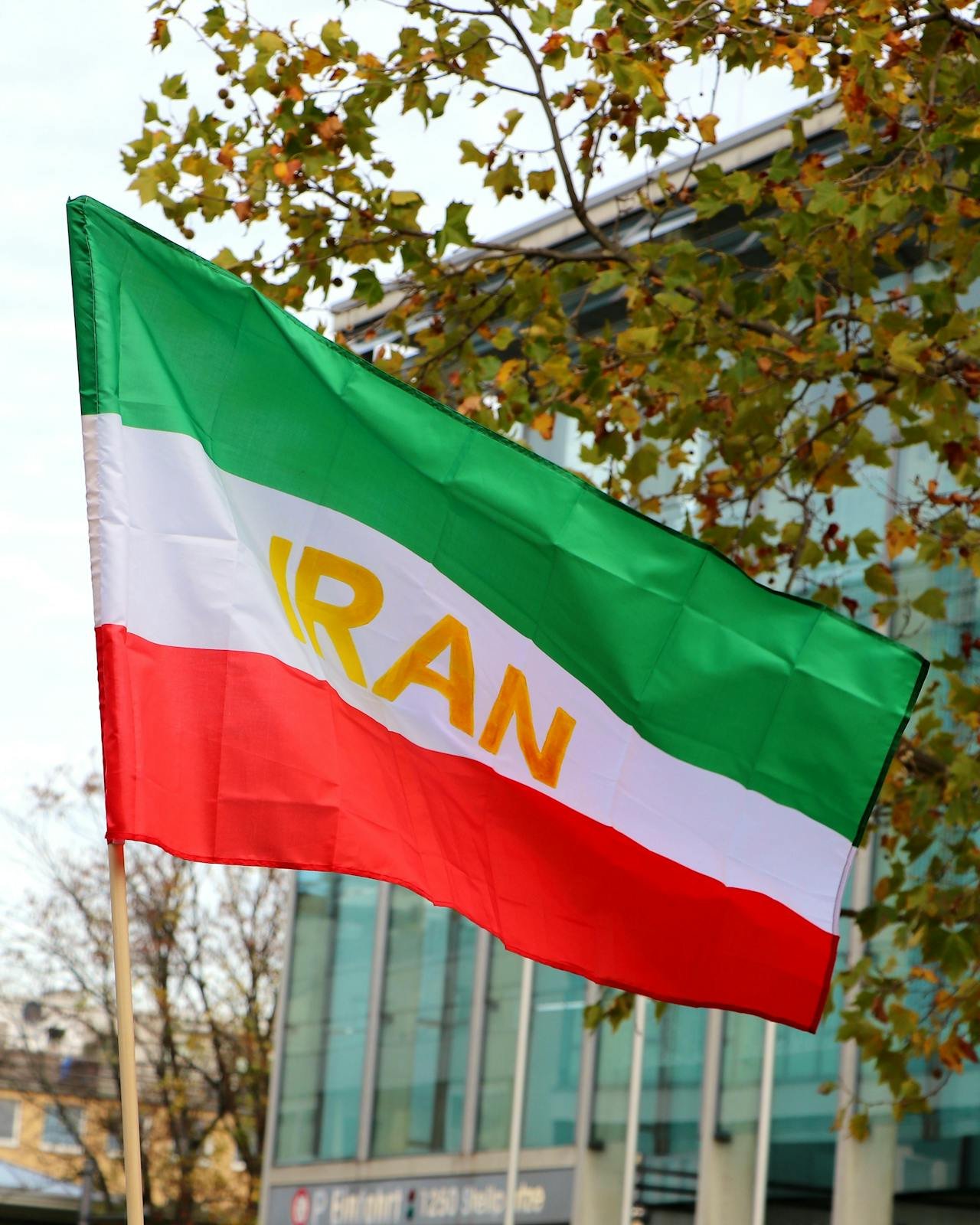Iran flag waving — post-war Iran JCPOA revanchism geopolitics