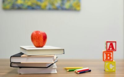 Student preparing for JIPMAT 2026 with books and notes for IIM Jammu and IIM Bodhgaya admission